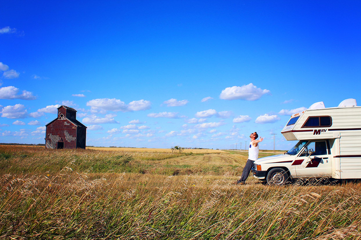  In a yellow field under a clear blue sky somewhere in Saskatchewan