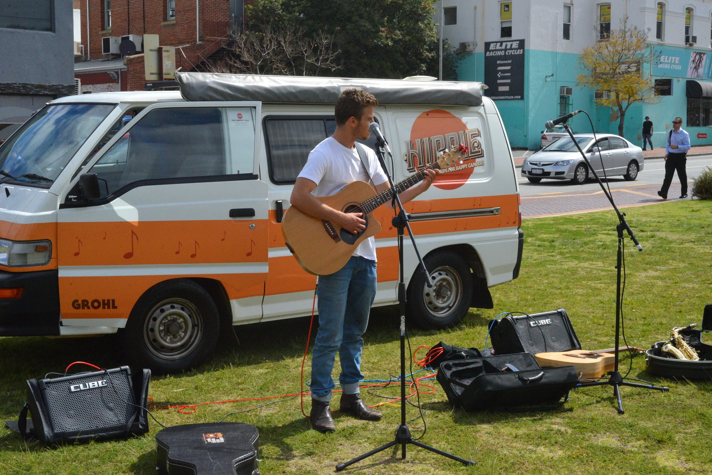 Adam Harpaz playing for a charity organisation while they feed the homeless people of Perth City