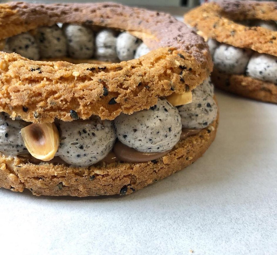 It&rsquo;s been over 4 years since we introduced this pastry. Though it reincarnated as a Paris-Brest since last year, the process remains unchanged. ⁣
⁣
It starts with tender choux pastry⁣
which we bake with a black &amp; white sesame craquelin for 