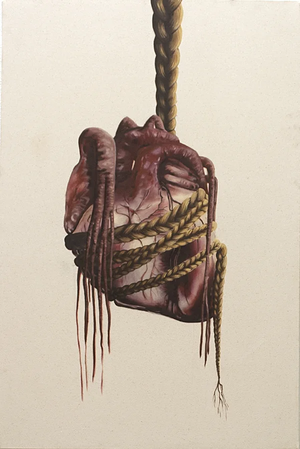 heart hanging from braid.jpg