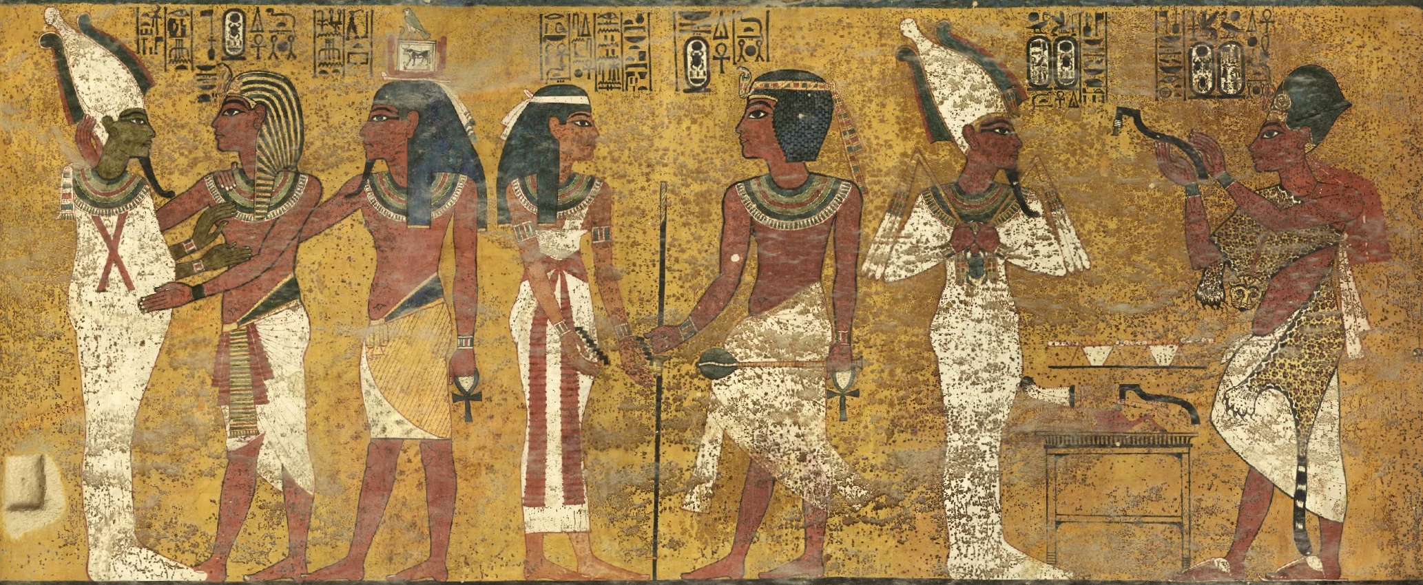 The north wall of Tutankhamun's Burial Chamber presents the principal stages in the king's transition from this world to the realm of the gods. The scenes read from right to left; the Opening of the Mouth of Tutankhamun's mummy by Ay, the next pharaoh; Tutankhamun welcomed into the Underworld by the goddess Nut; and Tutankhamun, accompanied by his Ka spirit, embraced by Osiris, god of the Underworld.
