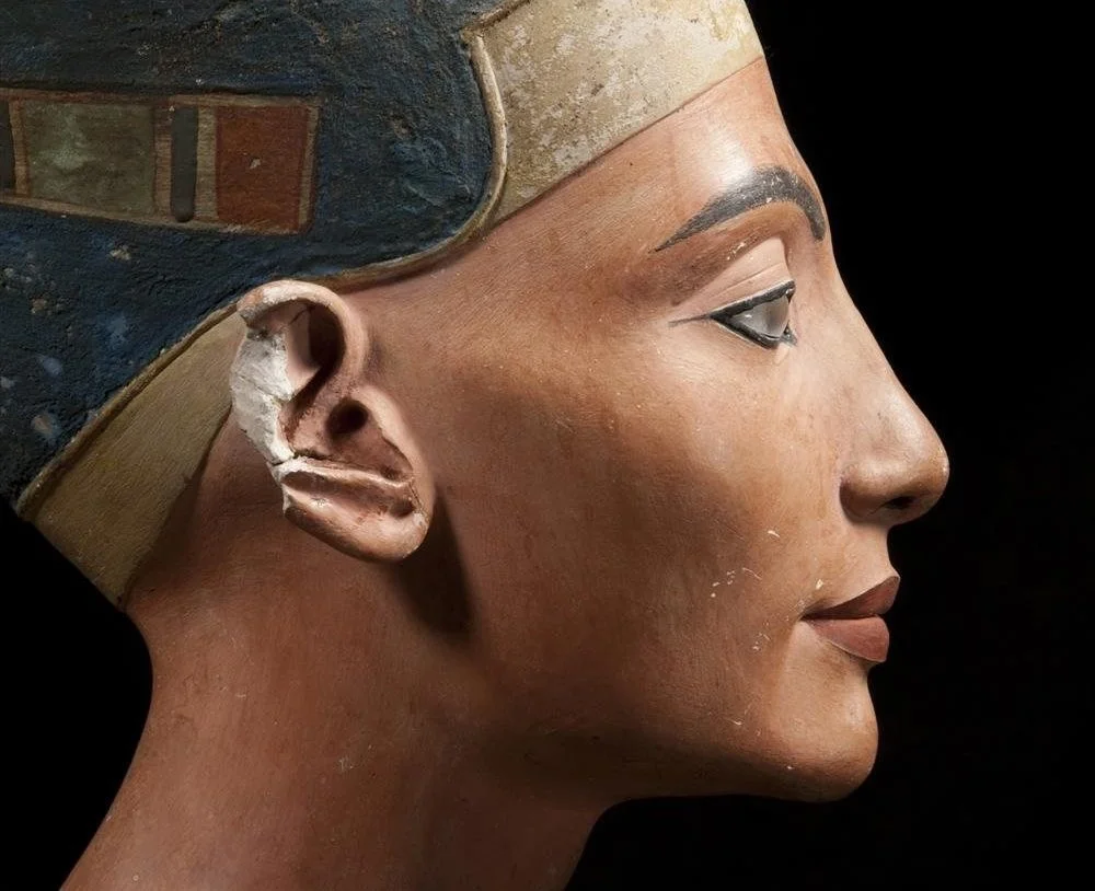 Compare the image on Tutankhamun's tomb wall with the Nefertiti's famous bust in Berlin. The jawline, brow, nose, chin, and distinctive 'oromental groove' all match. Reeves suggests that the Osiride 'king' is in fact Nefertiti and that the figure of the king performing the Opening of the Mouth ceremony is Tutankhamun, officiating at the burial of his predecessor.