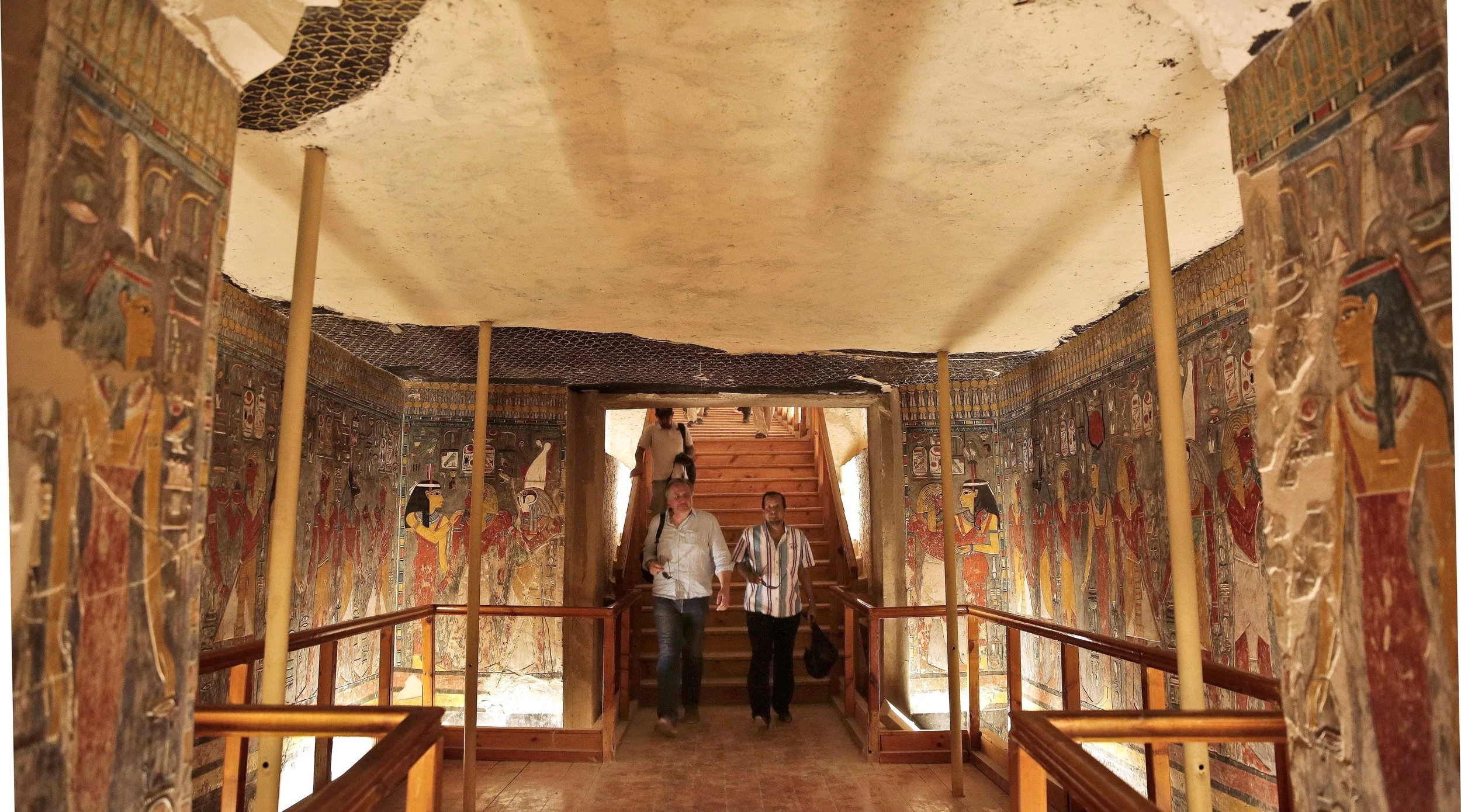 A false wall is a well-known ruse to try and deflect tomb robbers. Nicholas Reeves' tour on Monday started with the tomb of Horembeb (TT 57), the general who took the throne after the short-lived reign of Tutankhamun's successor, Ay. On the opposite side of a decorated well shaft was constructed a decorated false wall, designed to give the impression that the tomb corridor stopped there. The thieve weren't that easily fooled of course, and they cut through the decoration to help themselves to the king's riches. Pictured is Nicholas Reeves entering the descending corridor of Horemheb's tomb. Photo: Nariman El-Mofty.