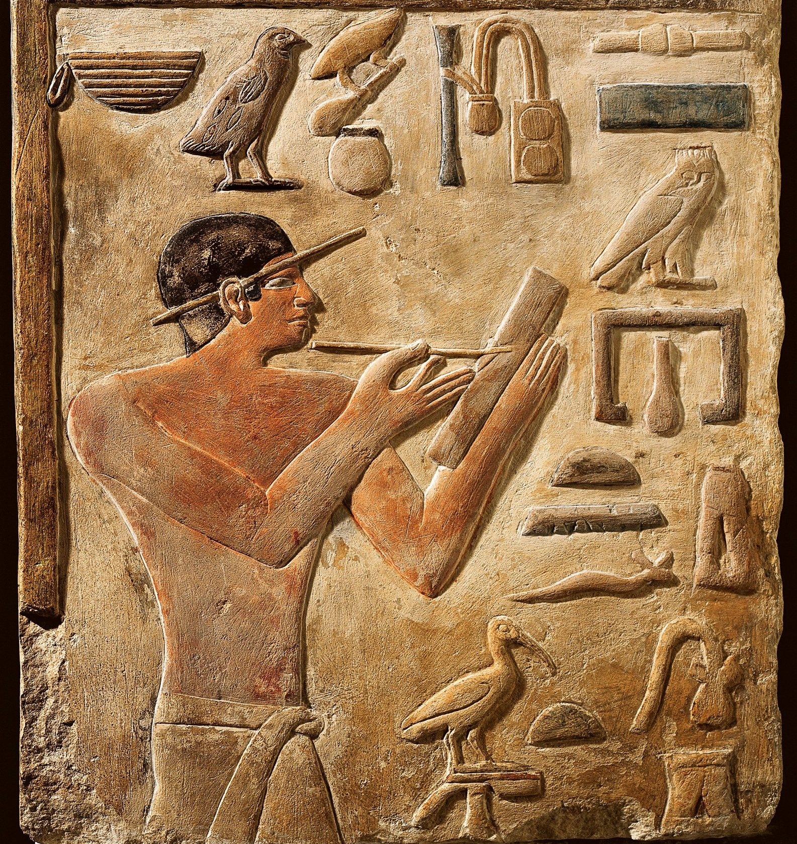 False door stele of Mery, Chief scribe of Saqqara royal archives. Detail Mery as scribe, Louvre 1C - G. Dagli Orti.jpg