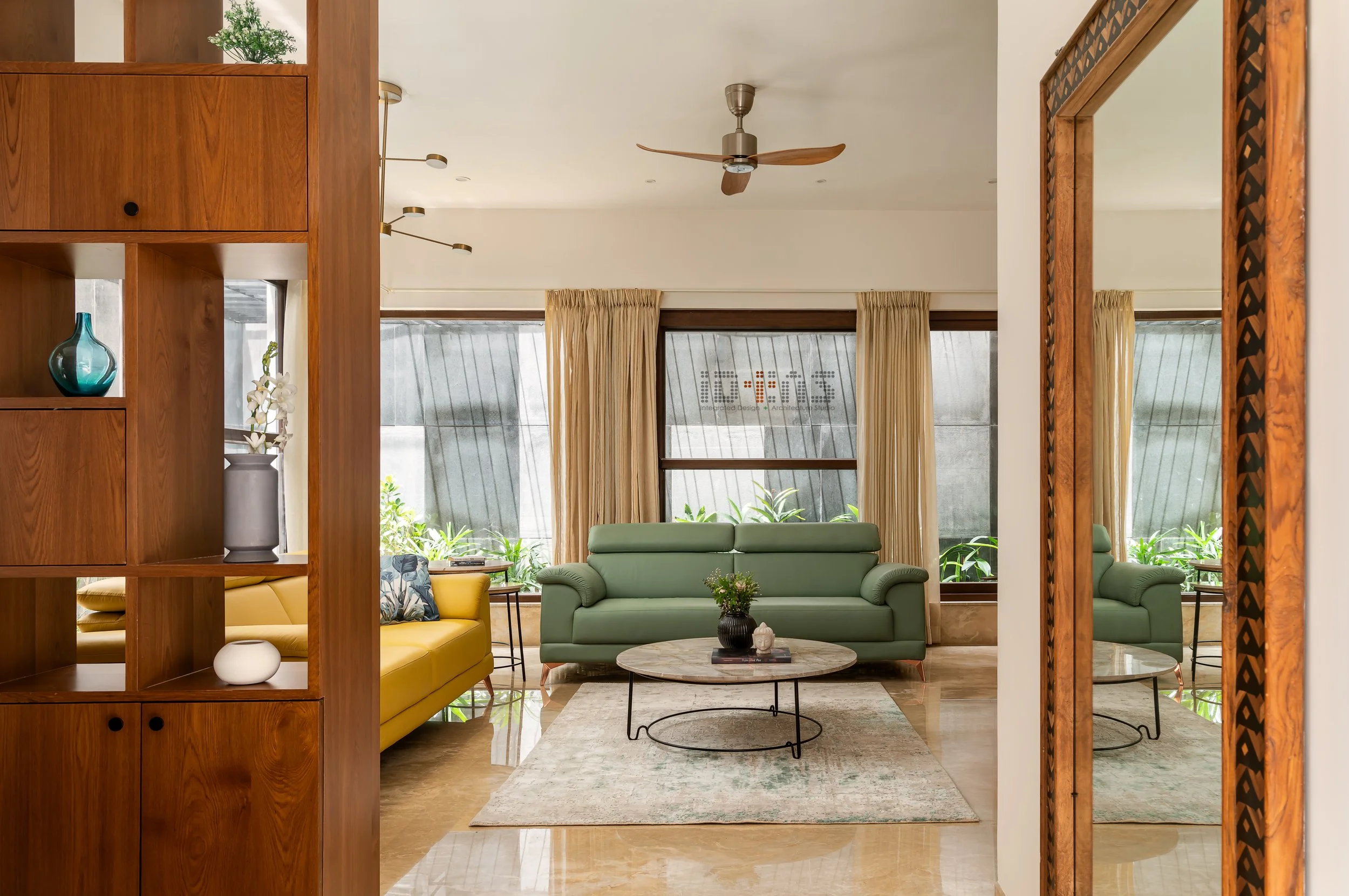 Living room seen through the carved doorway