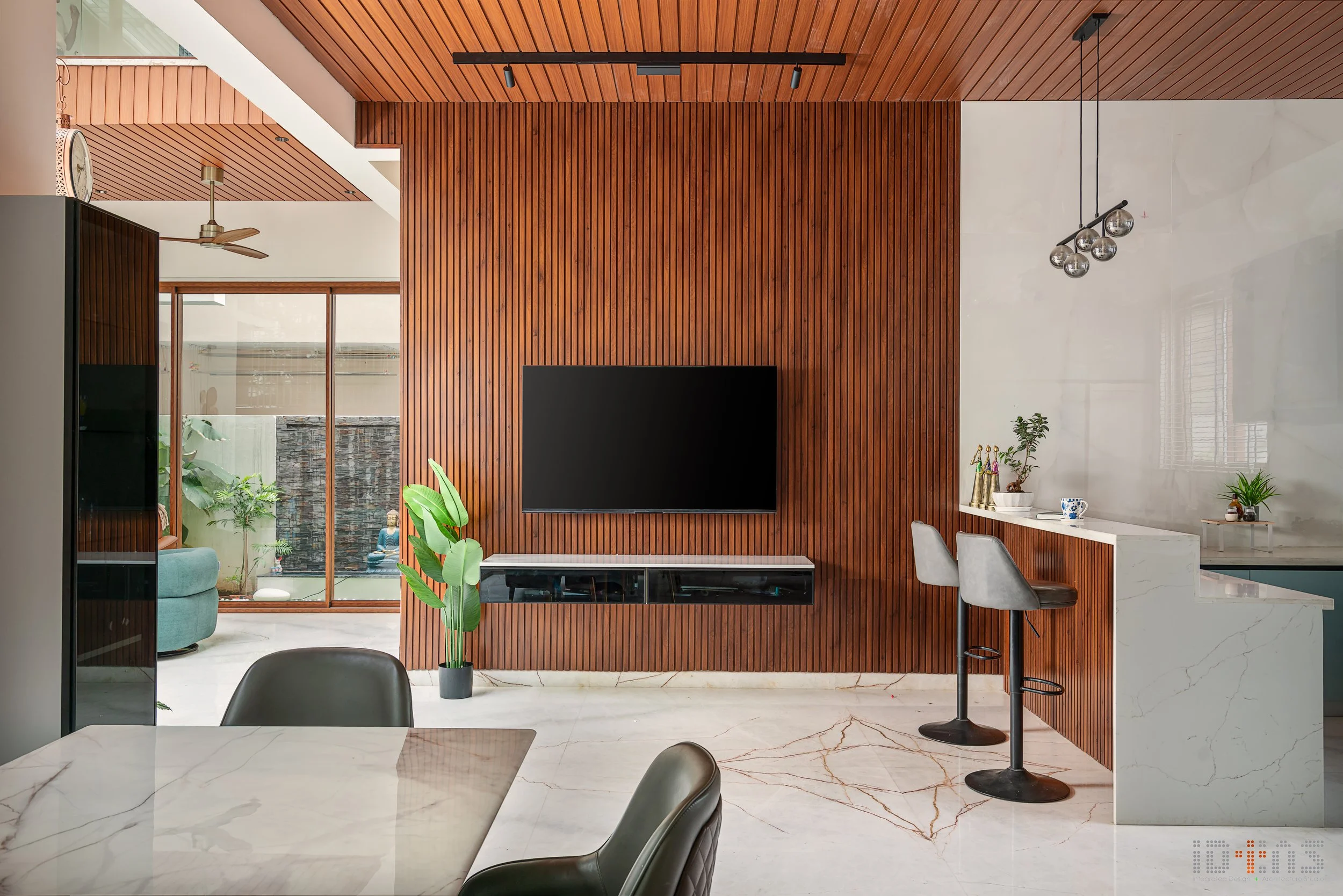 Family room with a timber television wall