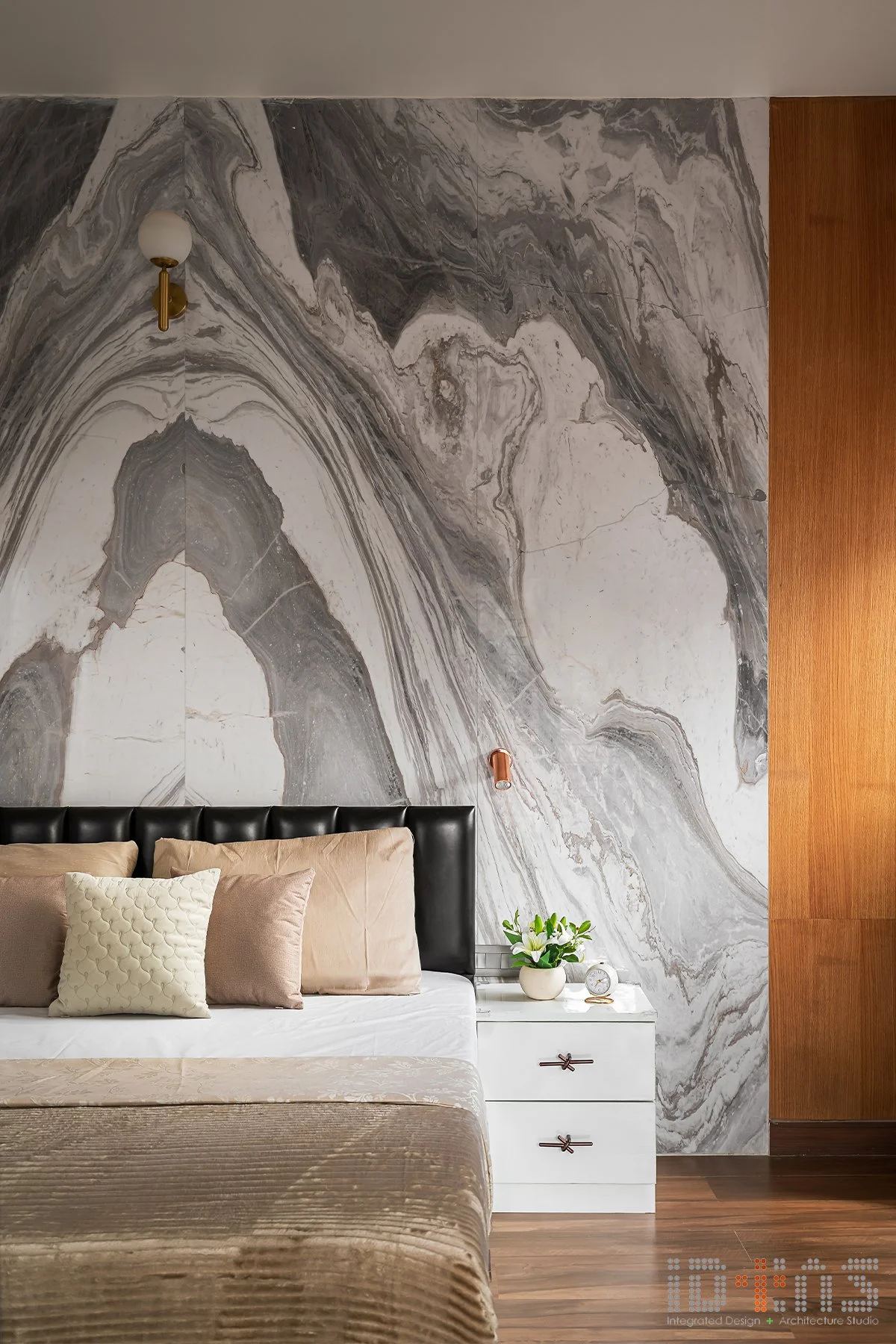 Bedroom with a marble wall