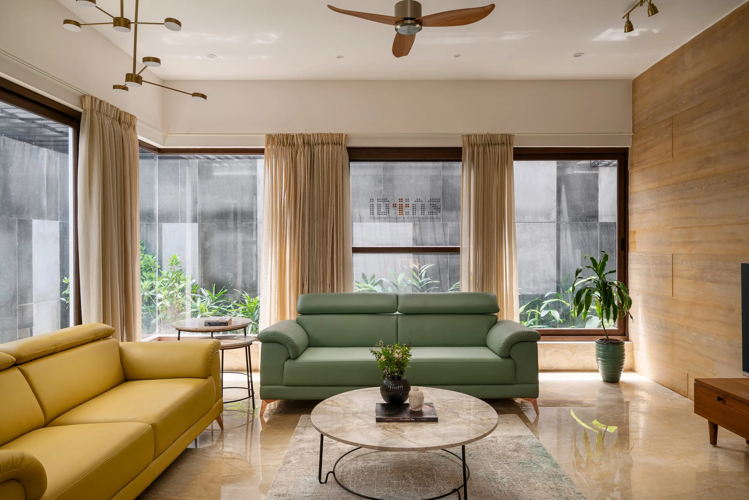Living room with the yellow and green sofas