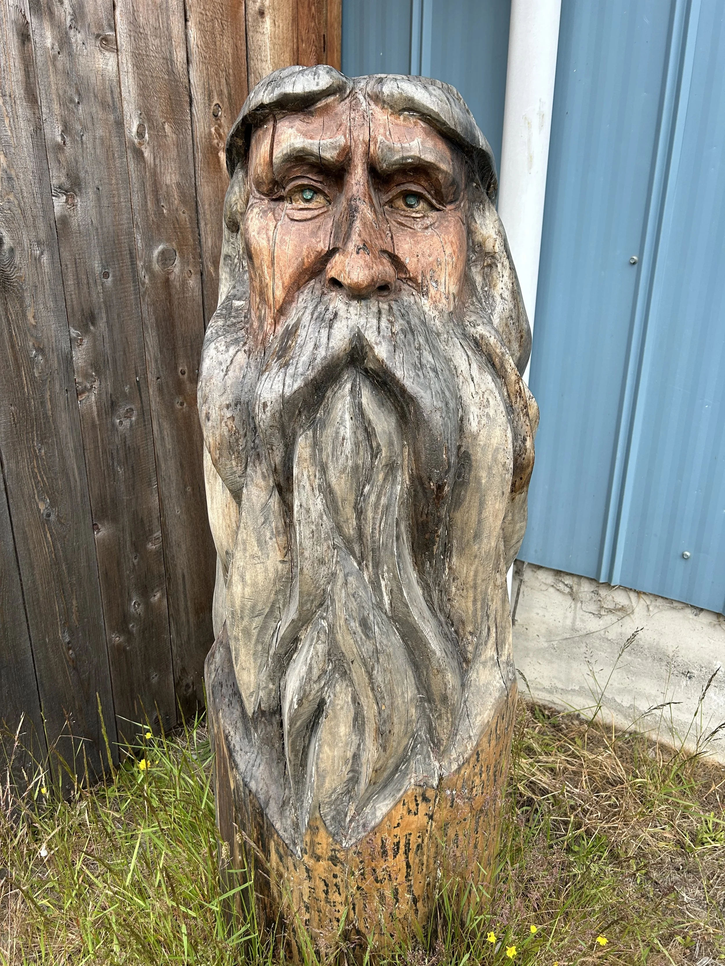 Rustic Wooden Carving of a Man with Beard