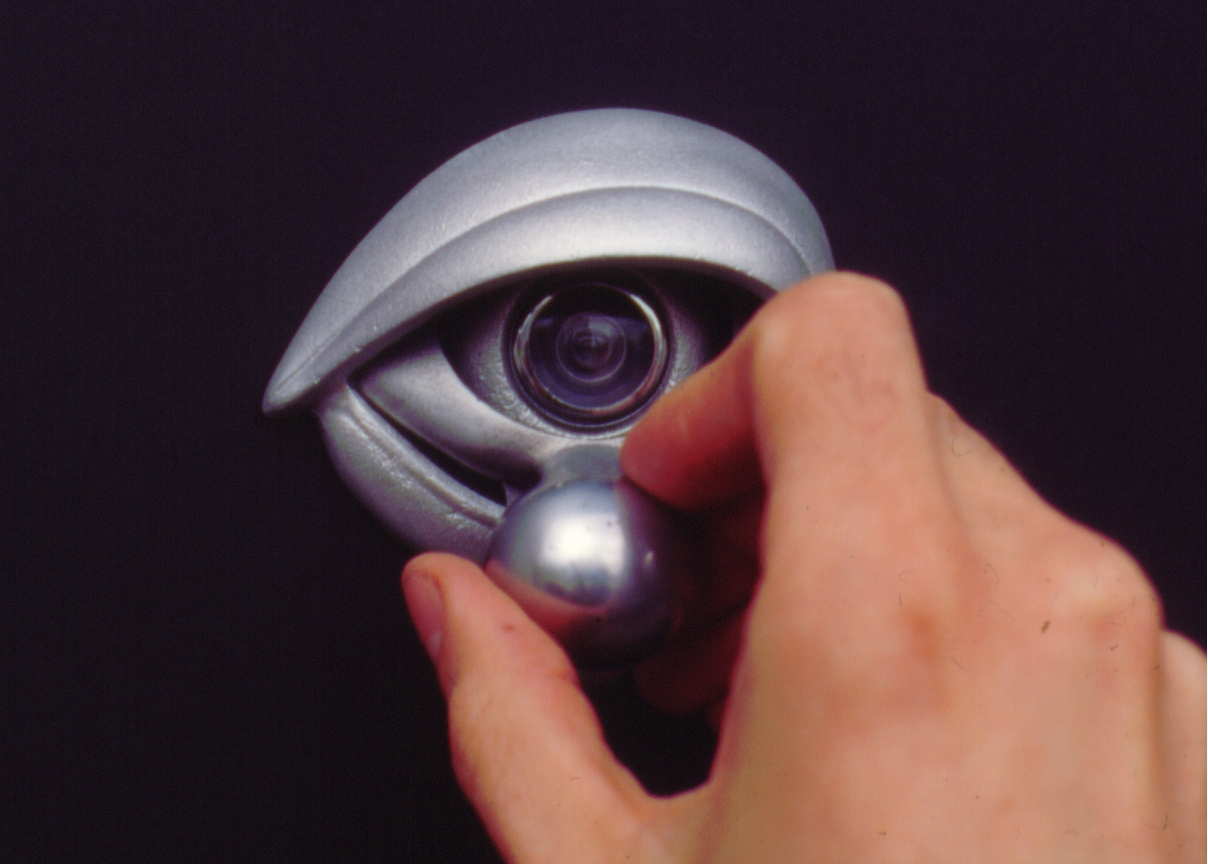  Oculus Door Knocker 1995 aluminum, door viewer 