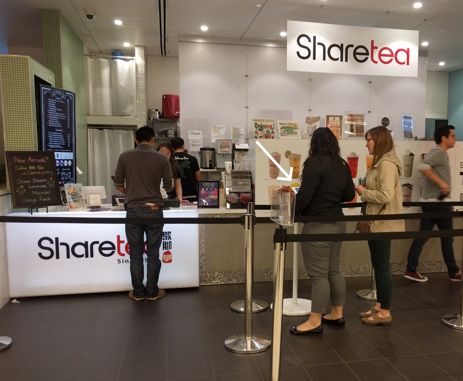 Testing a Customer Touchscreen stand prototype in store.