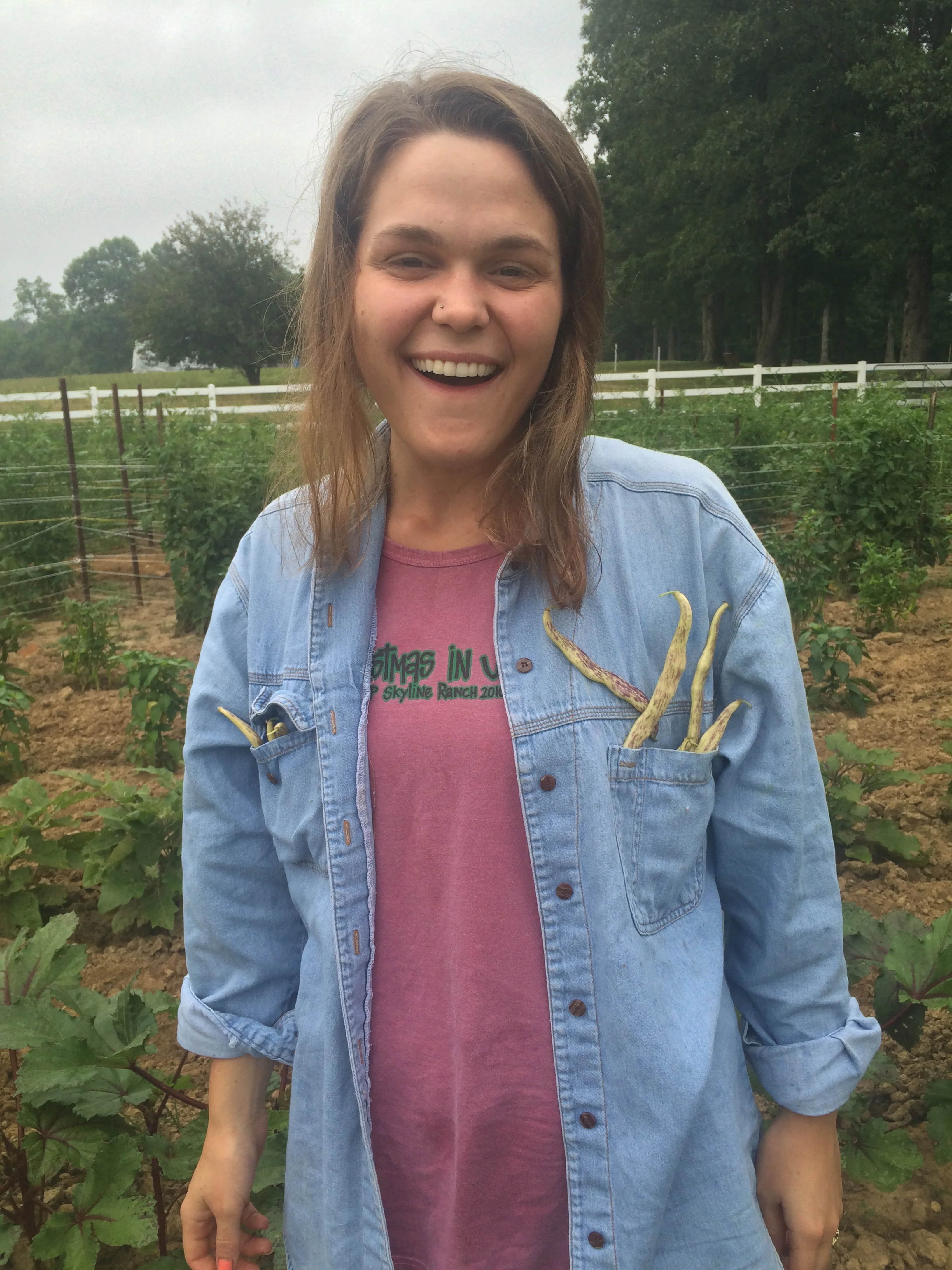 Cousin Sarah harvesting beans and putting em in her pocket!