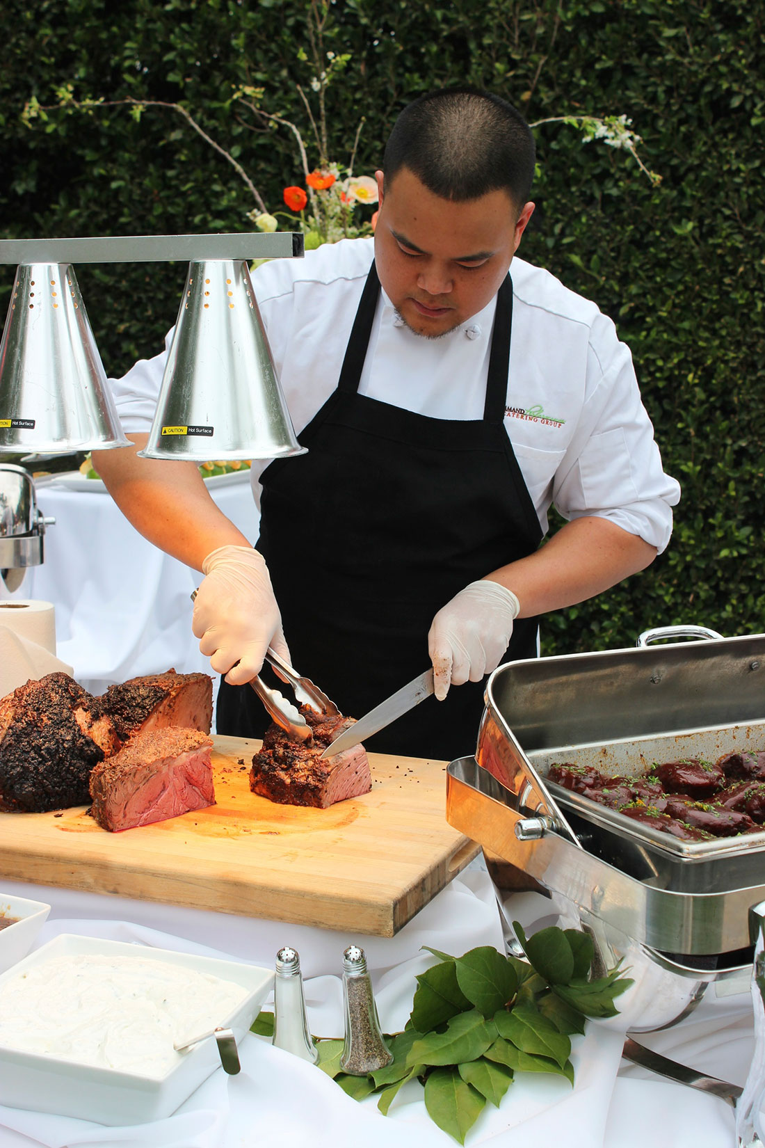 Chef preparing meat to be served