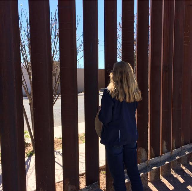 Nancy at a portion of the wall that has already been constructed