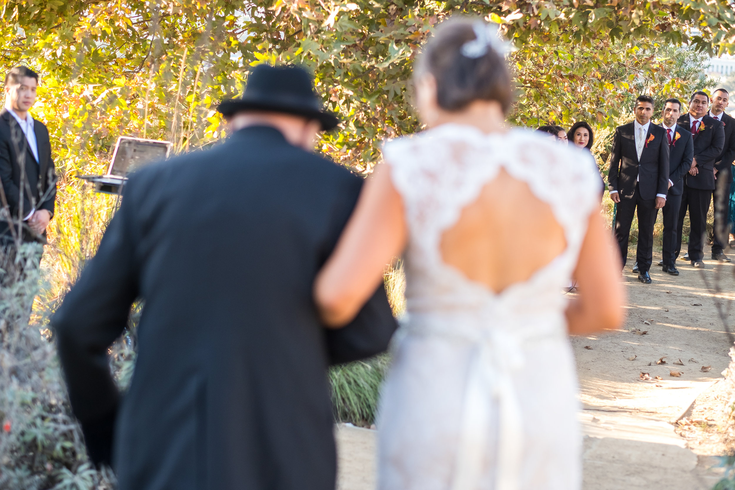 Bride and her grandfather walking down the aisle at a Baldwin Hills wedding