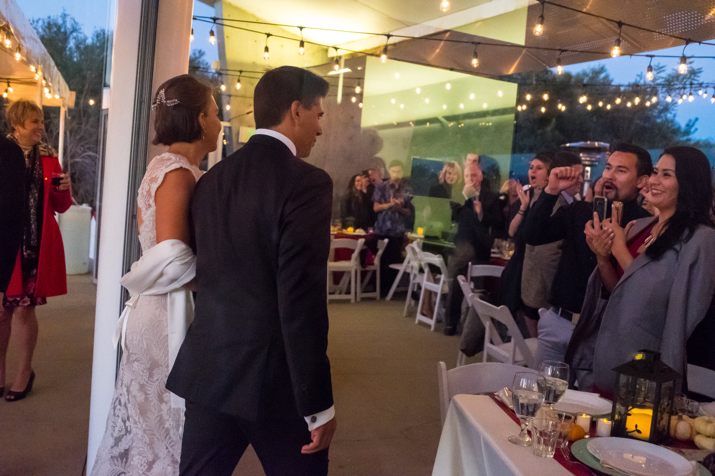 Baldwin Hills couple walking into their wedding reception 