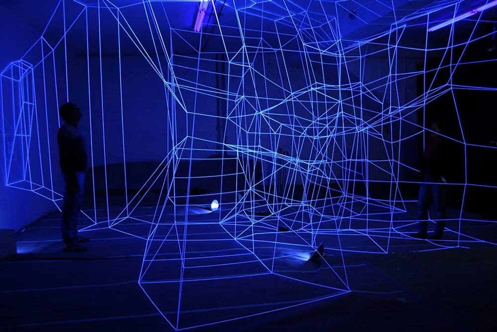 Degrees of Freedom (Placeholder for new work) , 2013 String, Nails, Black Light Variable dimensions