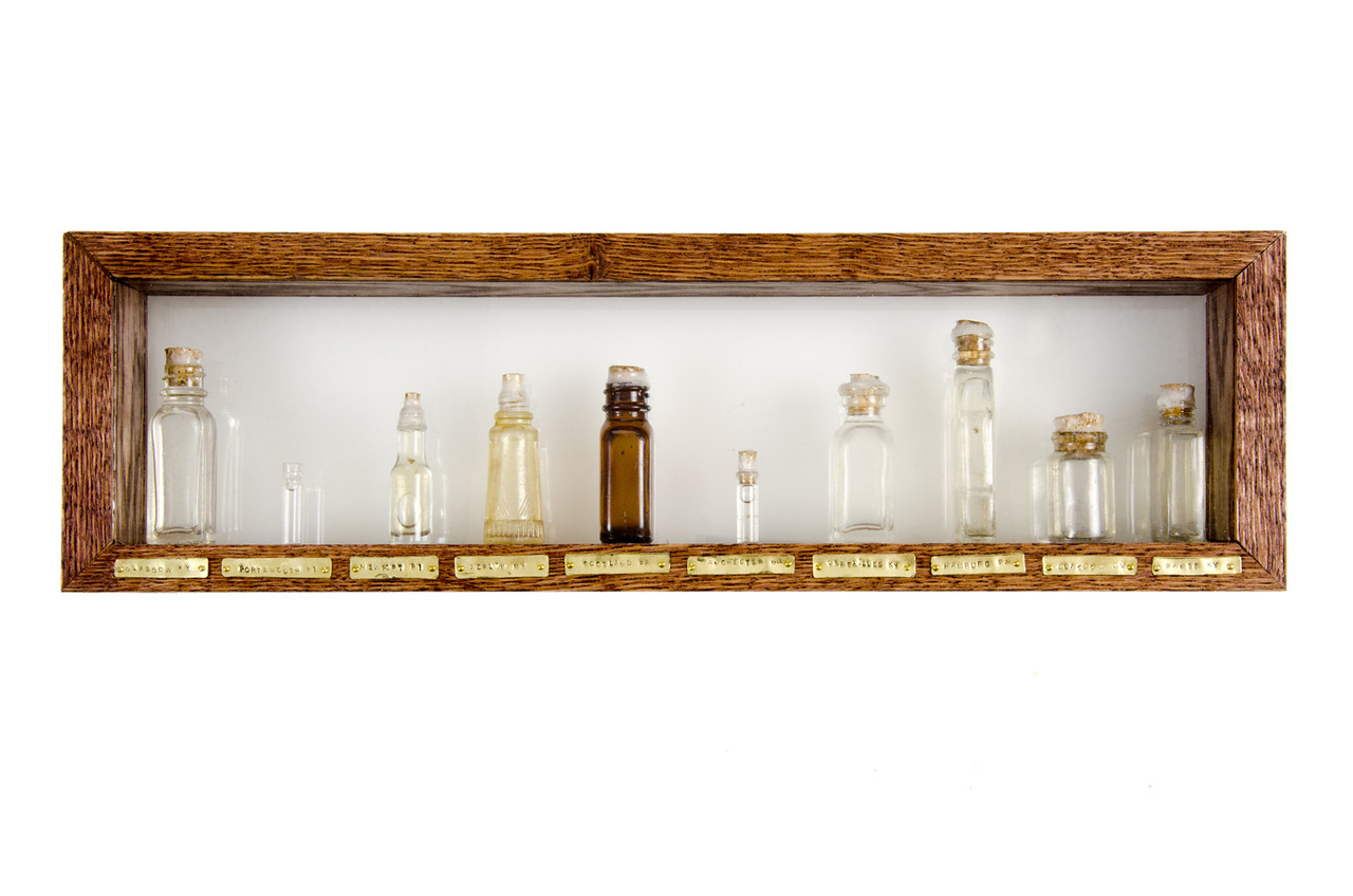 Water from American Towns with European Names , 2012 Water Samples, Found Glass Bottles, Glass Shadowbox 5.75 x 19 x 2.5 in.