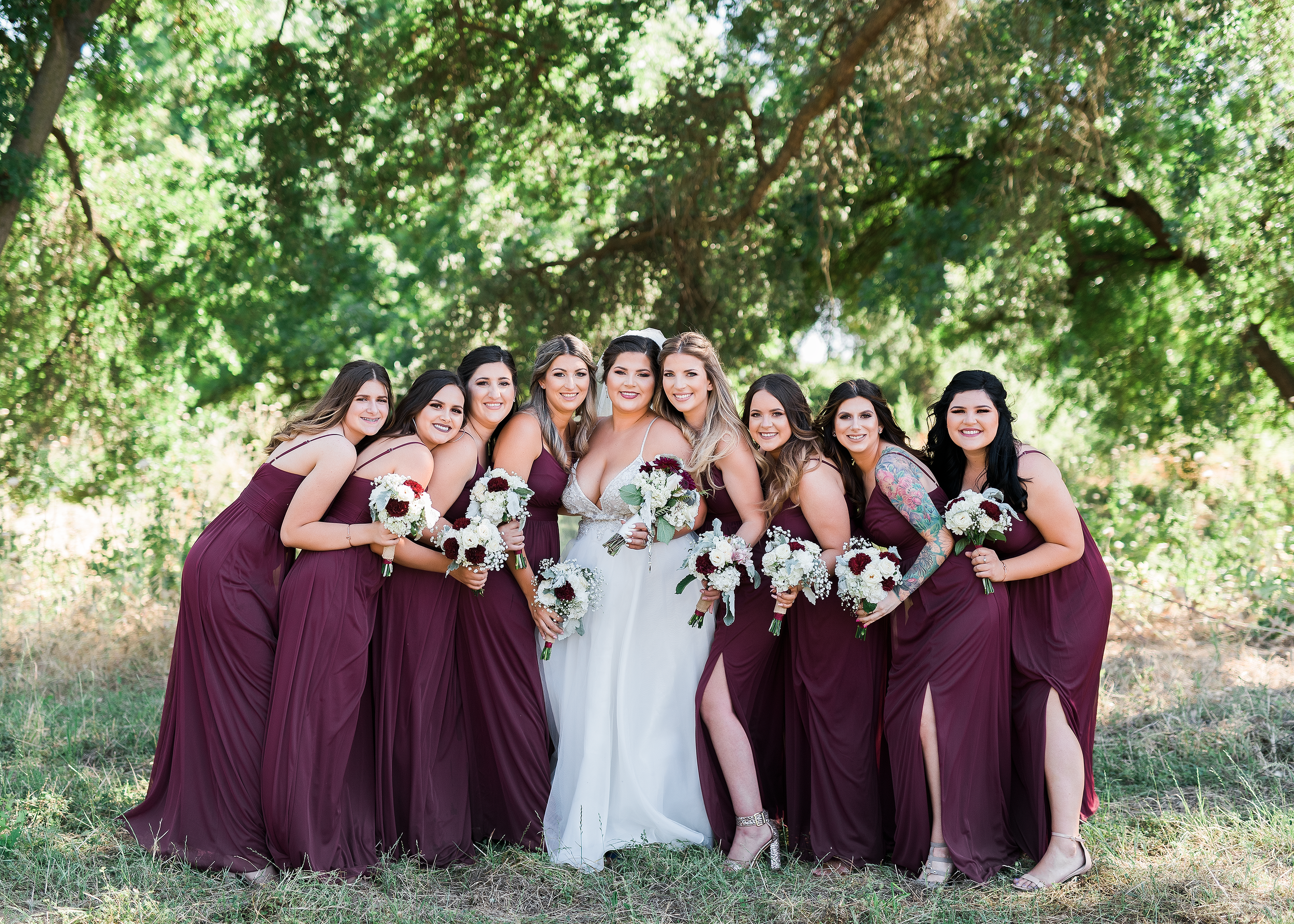bride with all her bridesmaids 