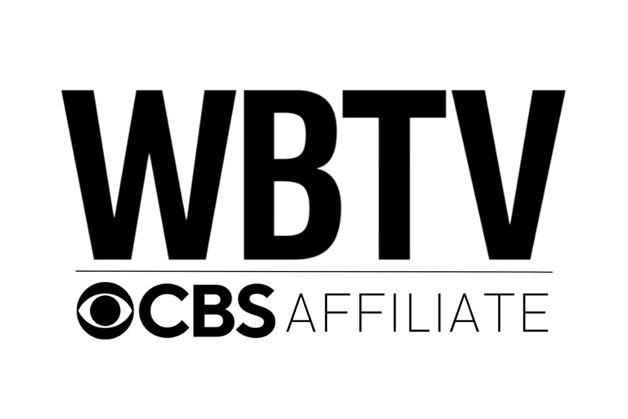 Logo with the letters "WBTv" in bold black font on a transparent background