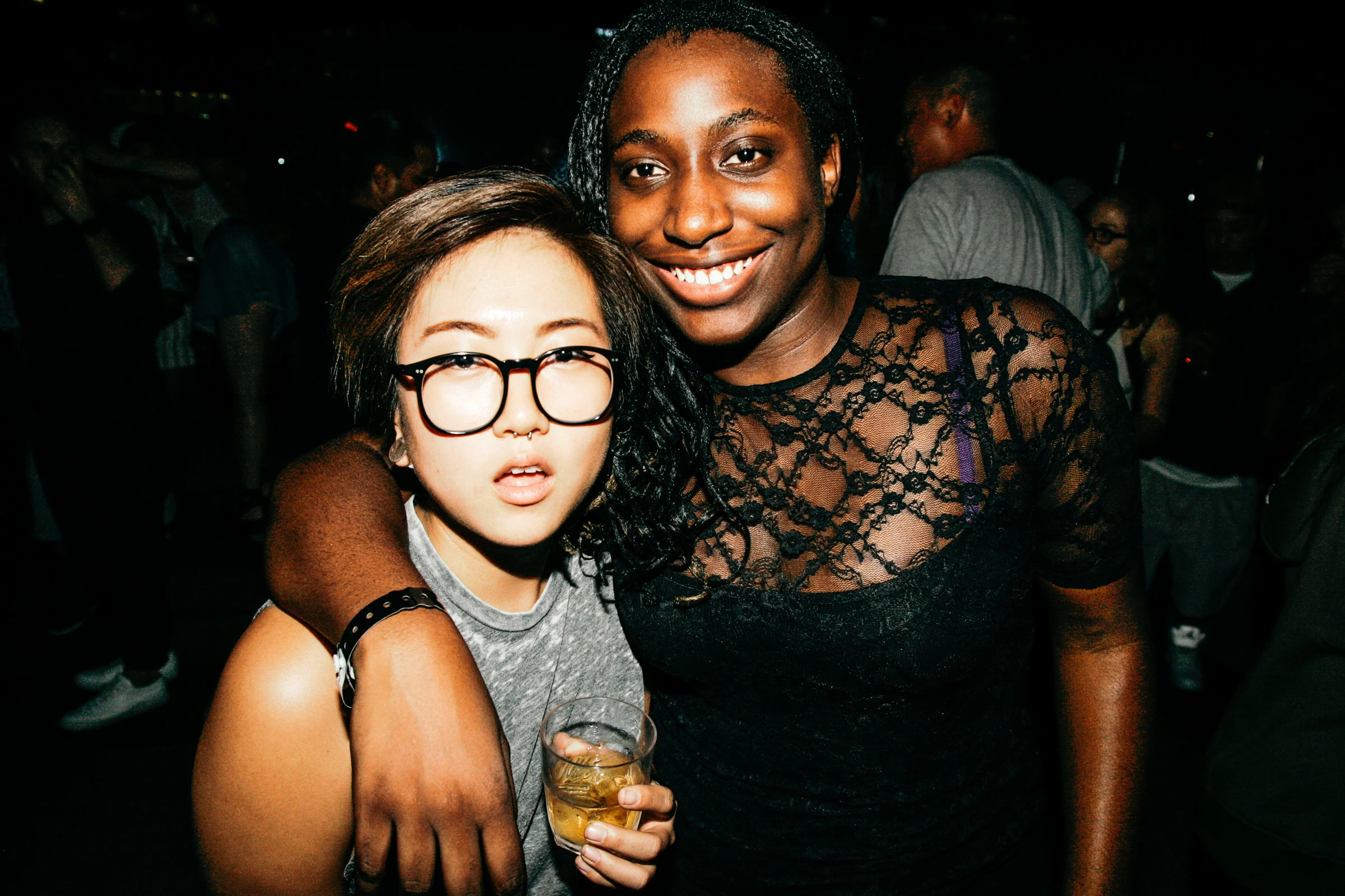 SUSPEND staff members Hannah RJA Song and Kayla Reefer at #NIGHTSWIMDTLA (Oct 1) presented by SUSPEND Magazine, HLZ BLZ, DOPE Fairfax, Ladies First Events, and LOVE+MADE. / Photo: © Jonathan Tate for SUSPEND Magazine