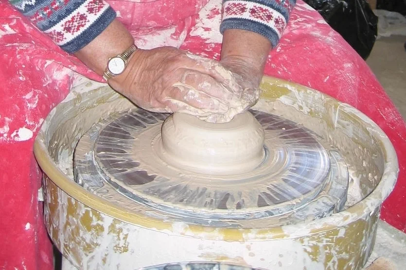 Sharon Wheelthrowing 2.JPG