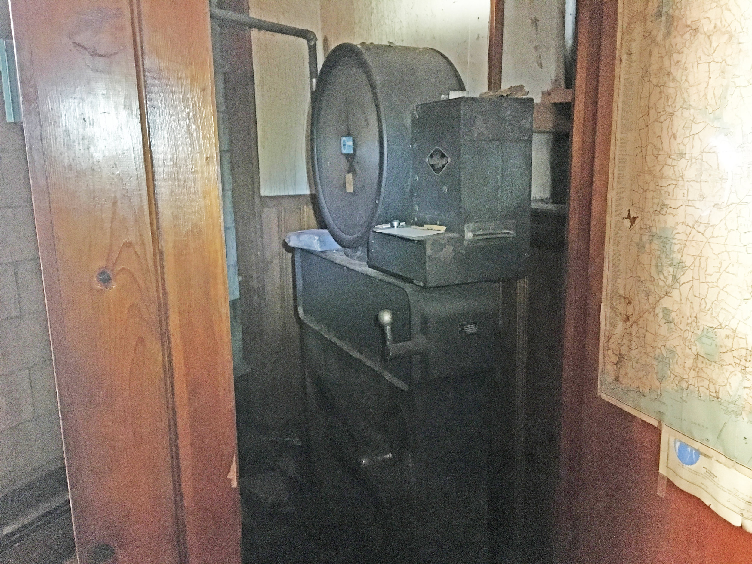 The scale in the basement, it read the weight of the trucks parked on the vehicular scale on the street