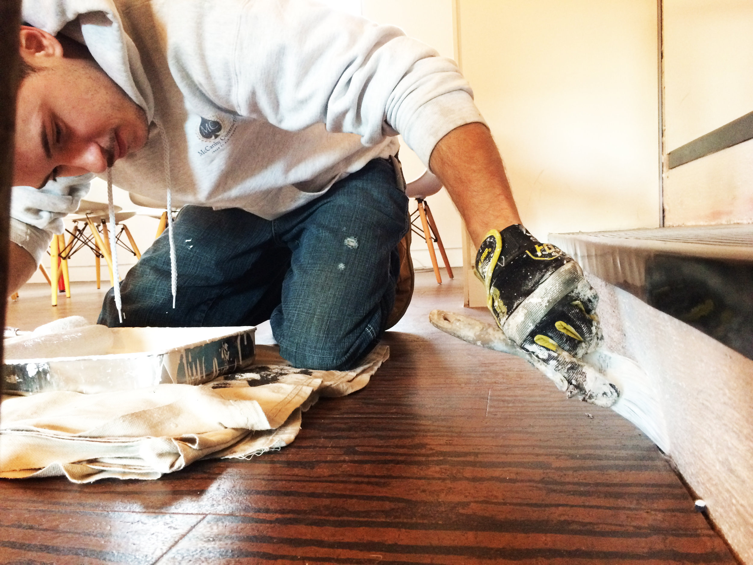 Rich, gingerly applying touch-ups 