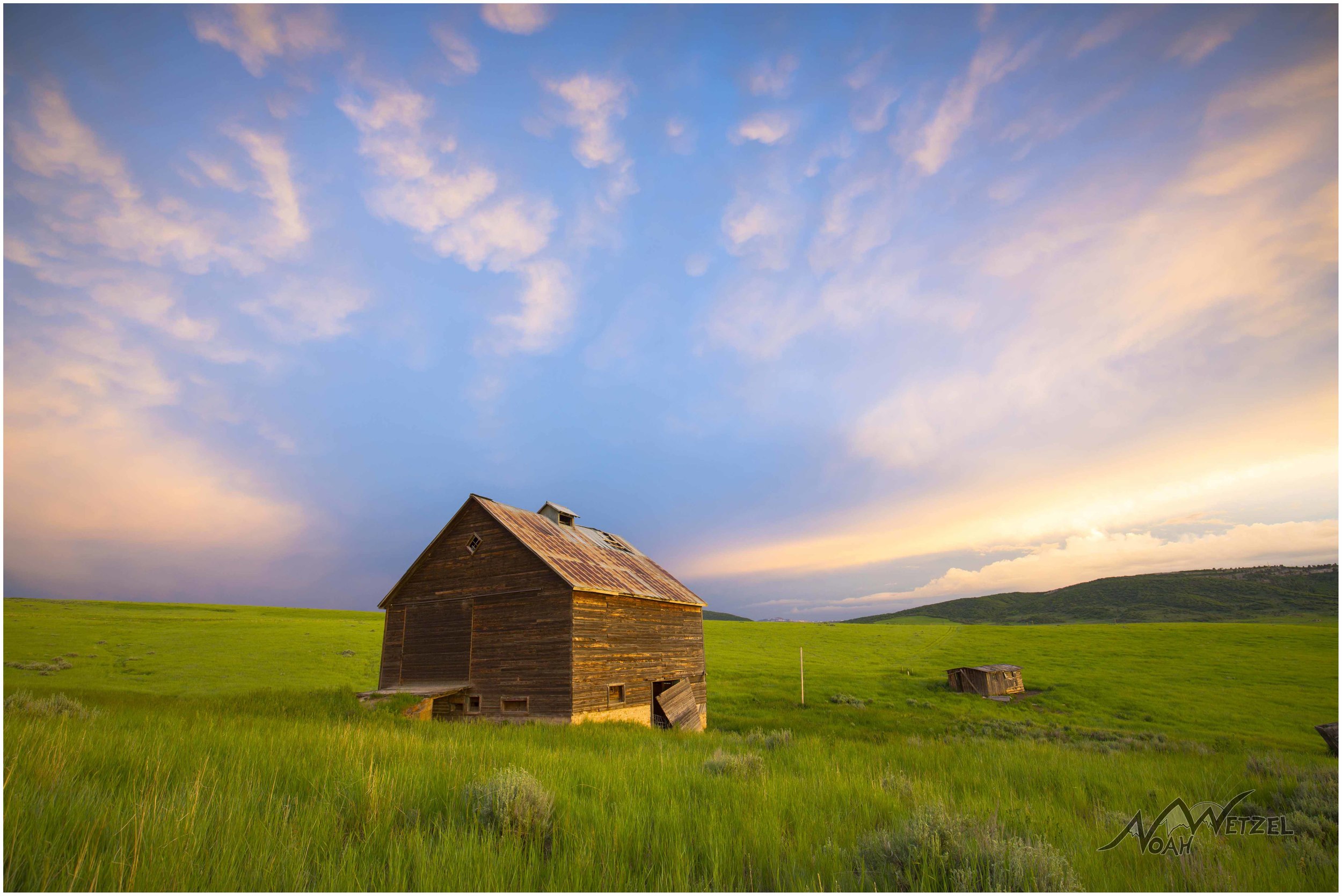 Barn Sunset on 20 Mile Rd. outside Steamboat Springs, Colorado. June 16th 