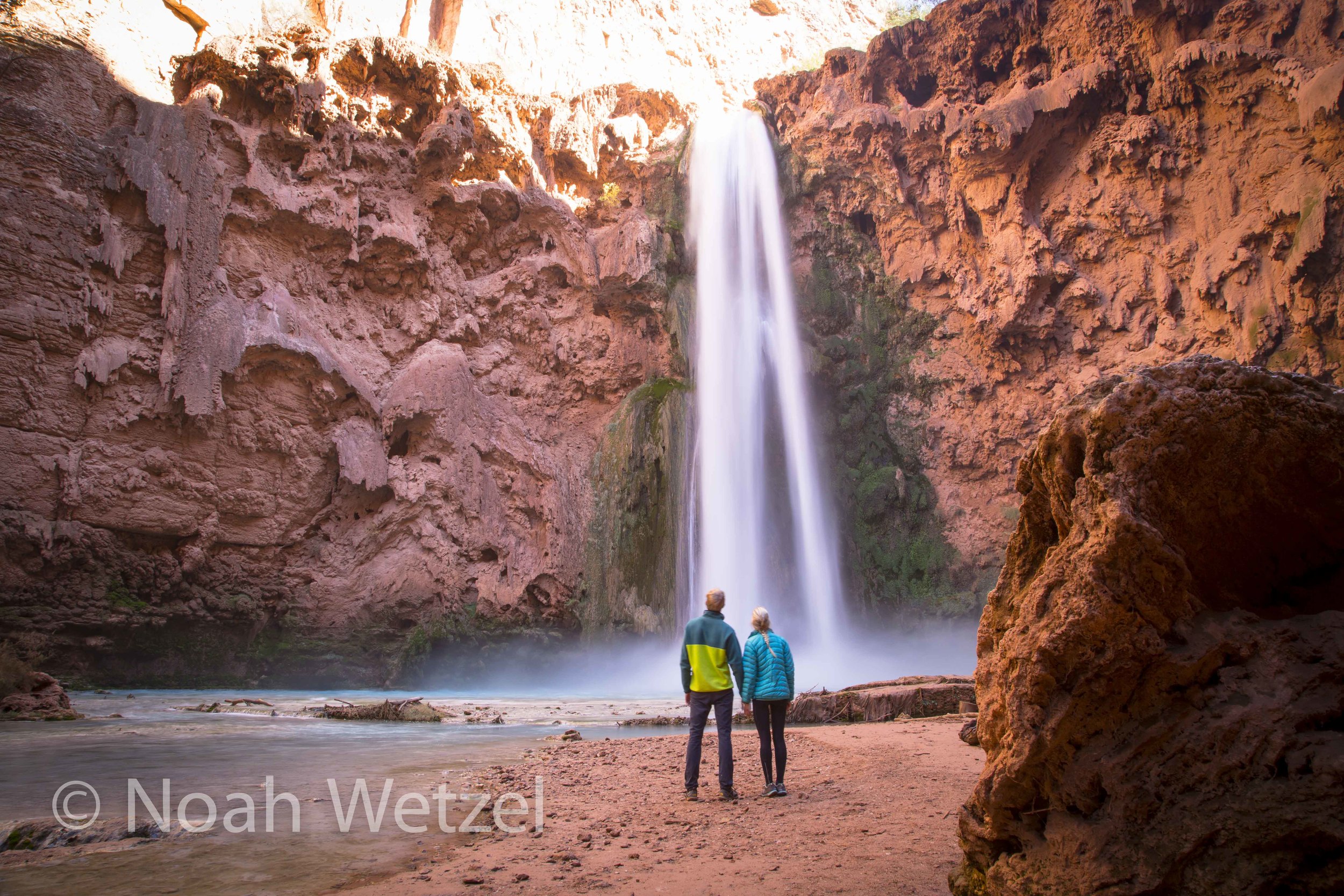 Jerome and Rachel soaking up Mooney Falls in Supai, Arizona