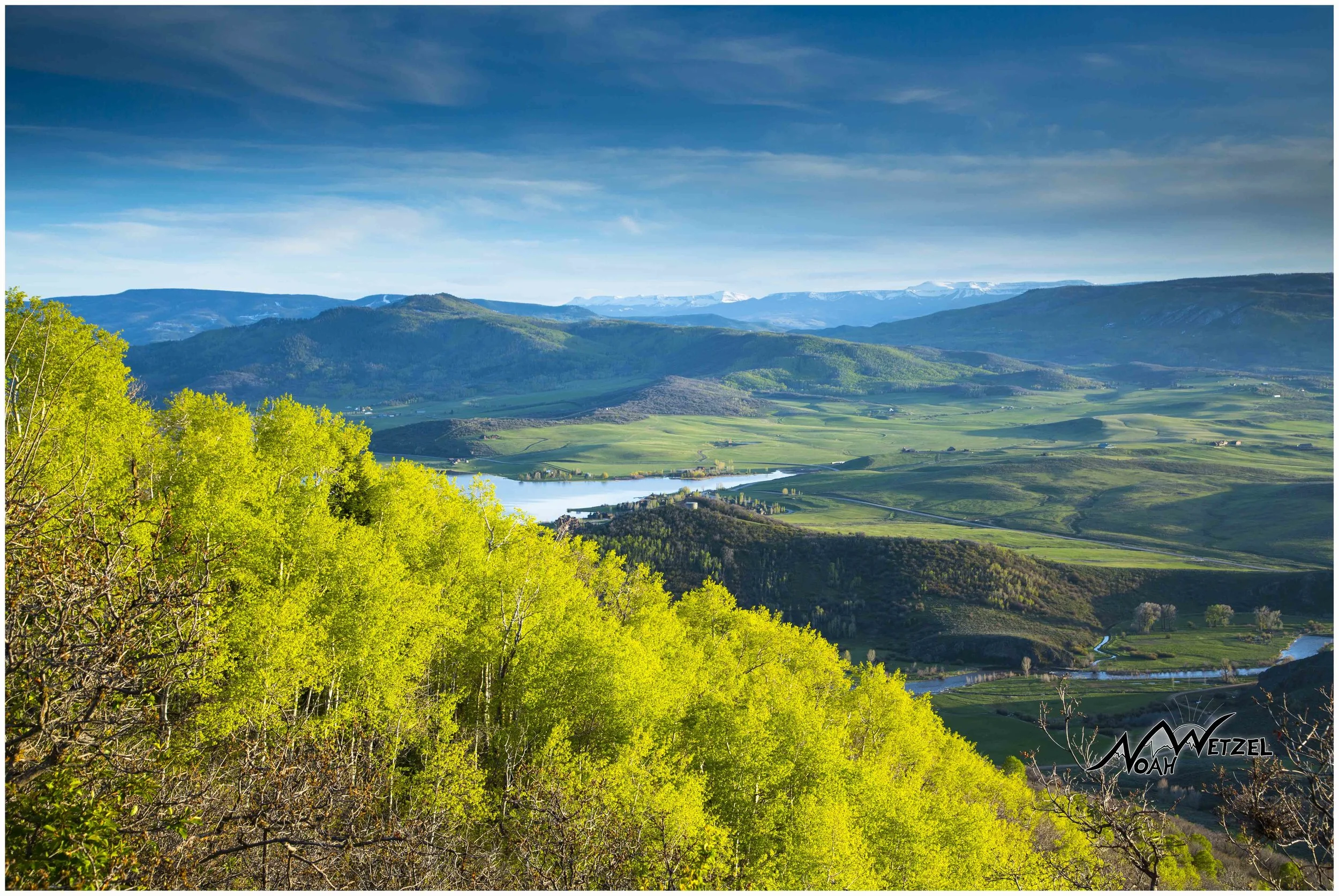 The Flat Tops loom in the distance over a lush Yampa Valley in the spring. 
