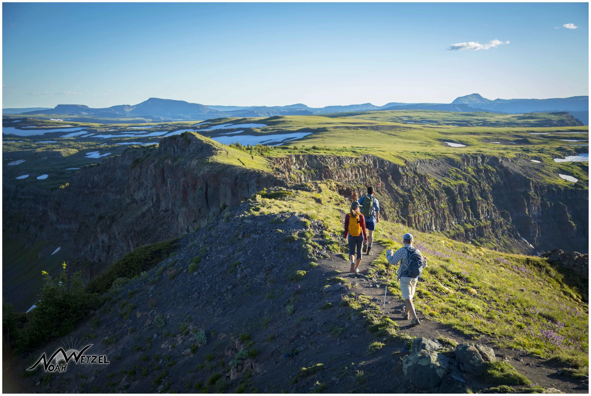 Miranda Schrock, JR Adams, and Jeff Pterka approach the Devils Causeway in the Flat Tops Wilderness. Colorado. 