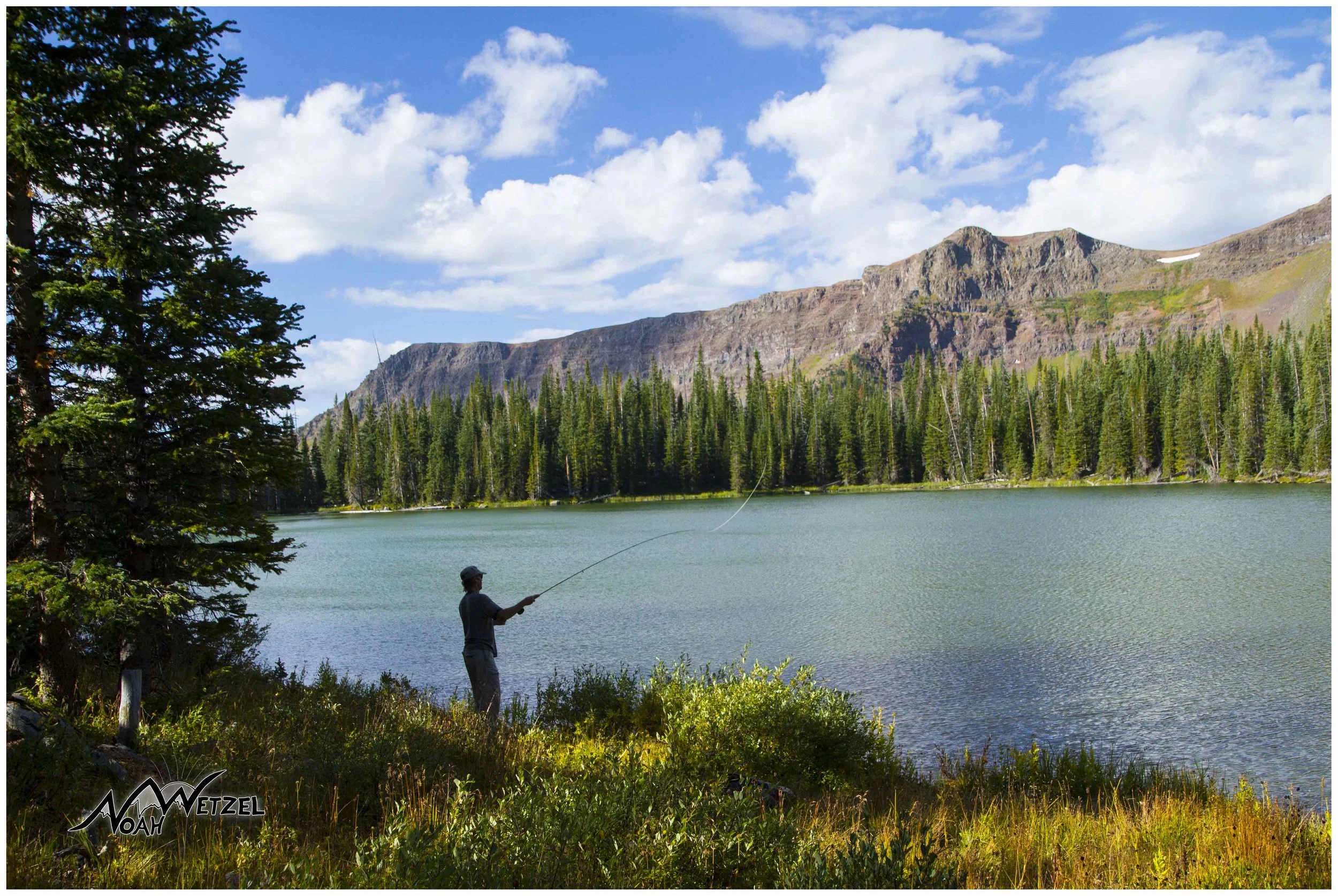 Aryeh Copa wets a line at Black Mandall Lake in the Flat Tops Wilderness of Colorado