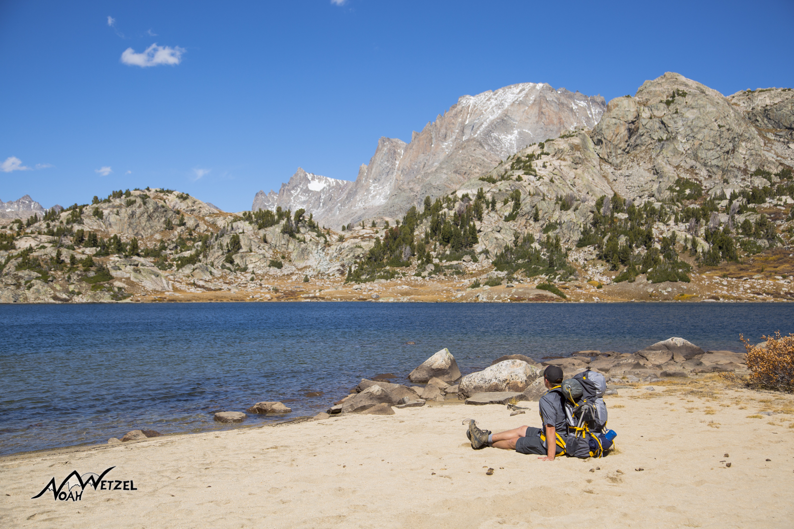 Ben Wetzel enjoying a high alpine beach on the banks of Island Lake in the Wind River Range. Wyoming