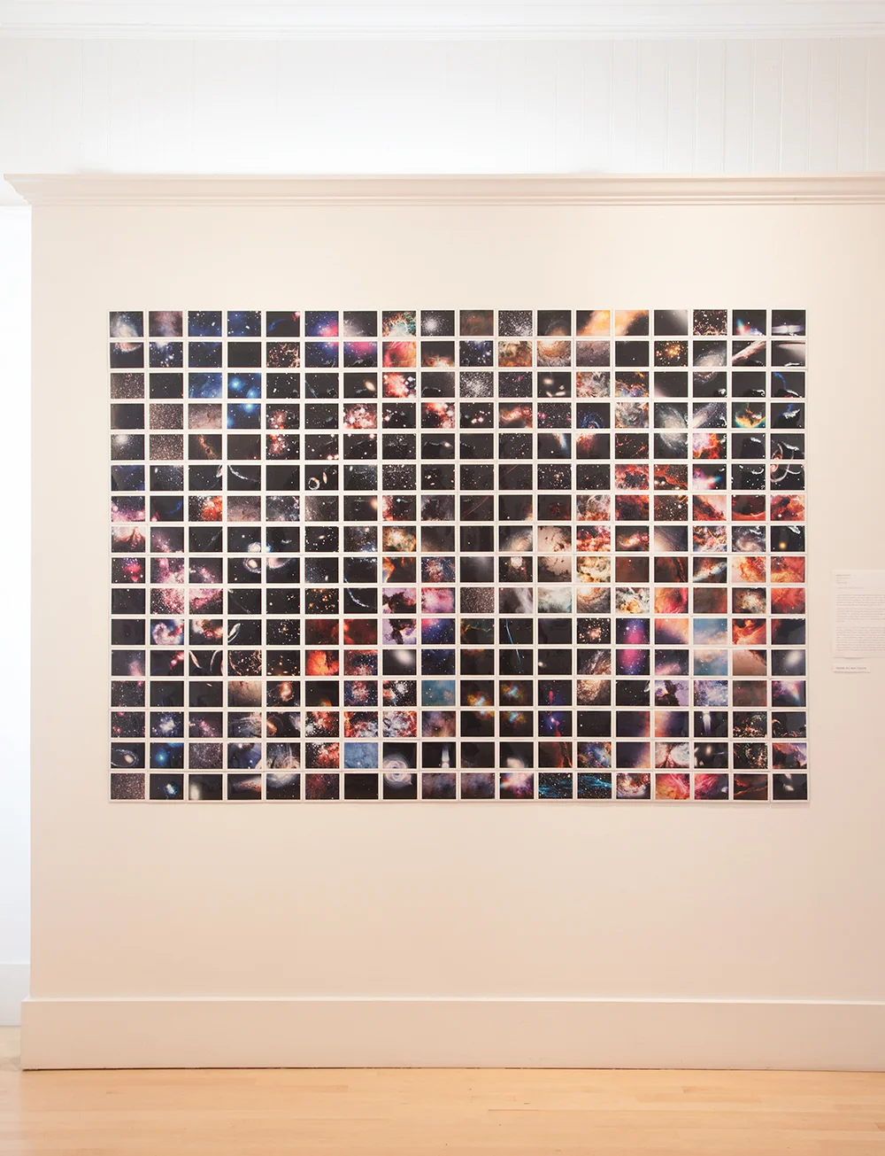 Cosmic Synthesis II installed in Cosmic Wonders: The Moon, The Stars, and the Space Between at Bolinas Museum, Bolinas, California. The piece is a montage of 288 Polaroids of outer space, 54 x 76.5 inches, 2013.