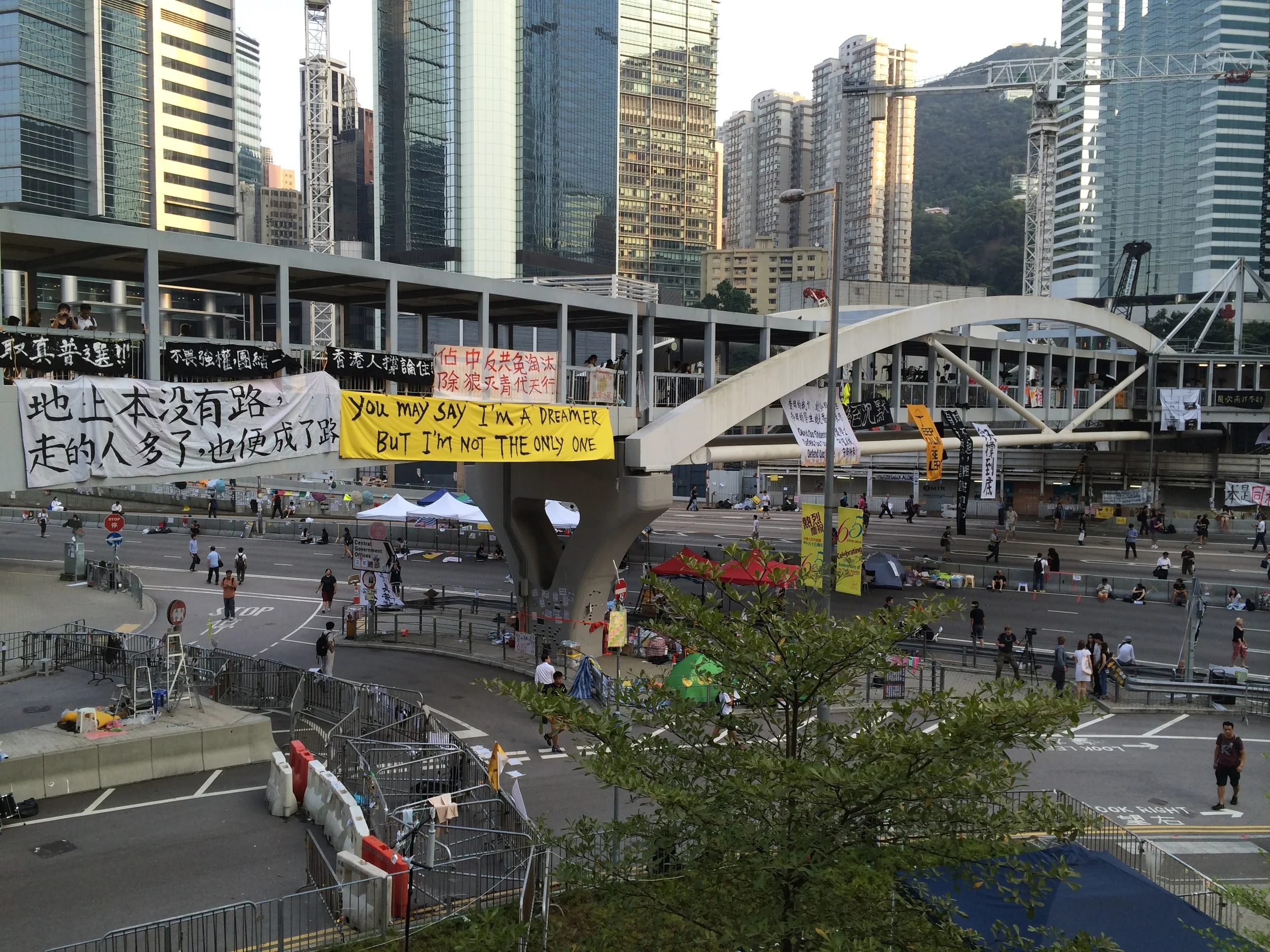 John Lennon's 'Imagine' flutters over the protest camp. © Katy Lee