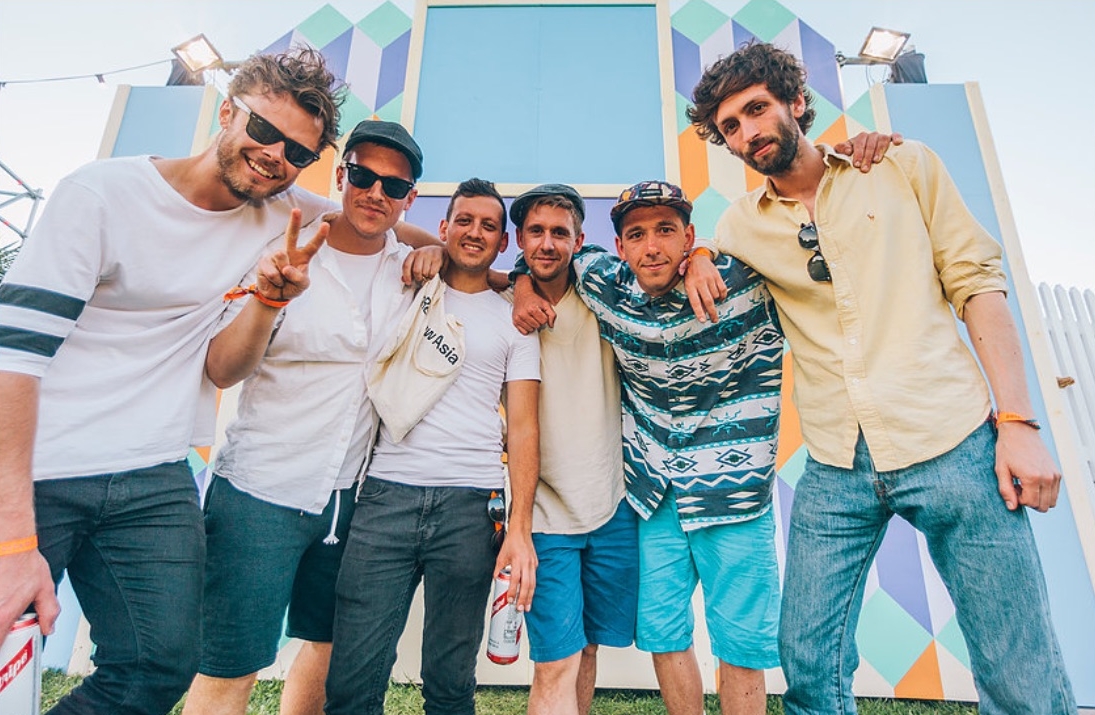 With my friends who play in a band called WOWH. Hugely social, massively positive, and people gravitate toward them. 