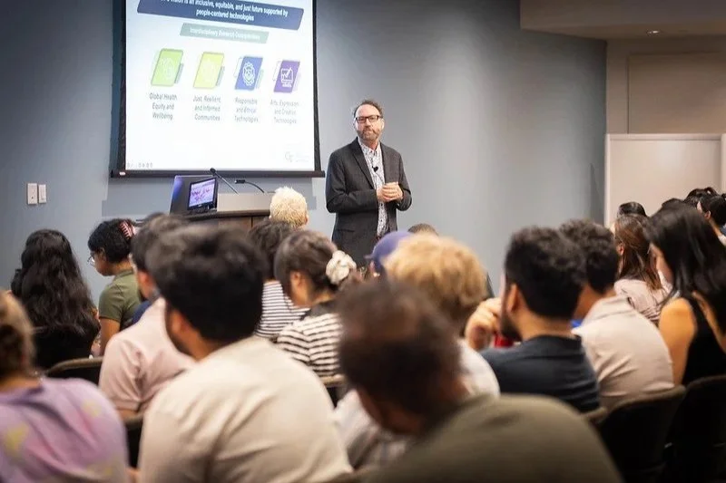   Dr. Michael Best, Executive Director of Georgia Tech’s Institute for People and Technology, presented “The IPaT Way: Things Happening at the Institute for People and Technology.”  