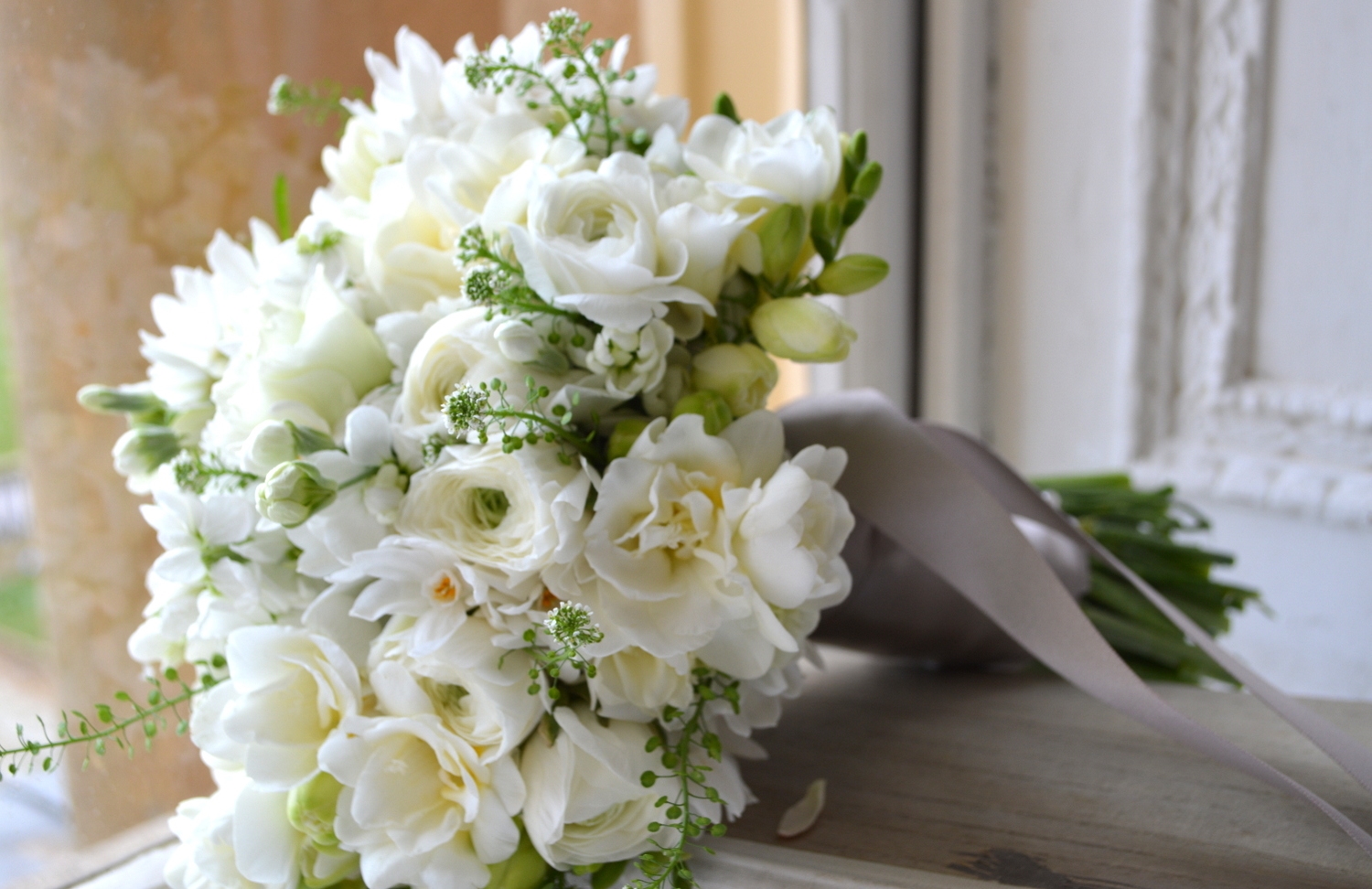 All white winter, wedding Bouquet with Ranuncula, Narcissi, Freesia & Hellebores