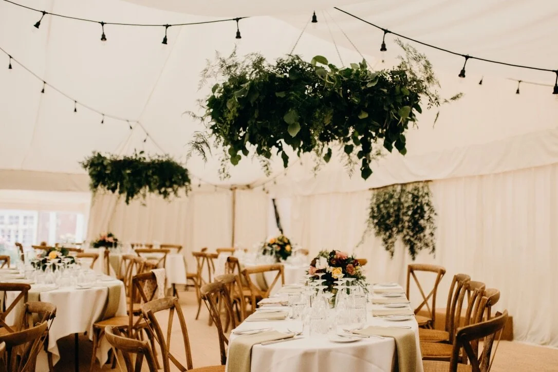 foliage hoops in marquee wedding