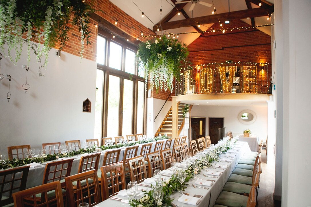 Foliage chandeliers for barn wedding