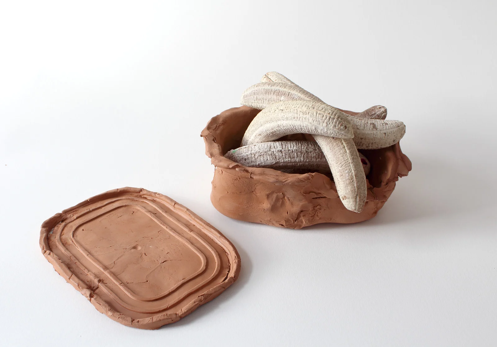 Untitled (Tupperware) , 2015 Plaster, air-dry clay 15 x 10 x 7 in