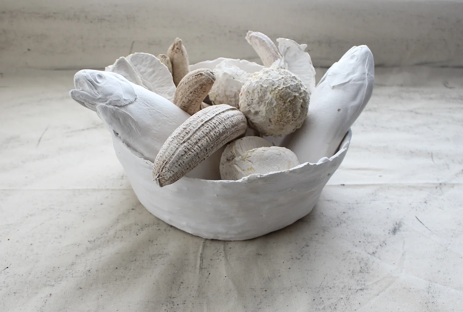 Fish Bowl , 2016 Plaster 10 x 14 x 14 inches Site specific installation at Governors Island Art Fair '16