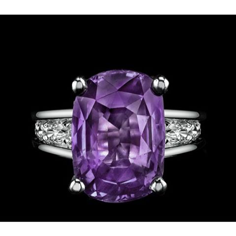 Beautiful rare velvety purple 8.00ct sapphire in a platinum setting with diamond accents by &nbsp;Robert Procop.
