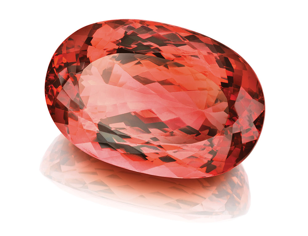 This untreated 45-carat imperial topaz displays an attractive reddish peach color. (Photo: Constantin Wild, Idar-Oberstein)