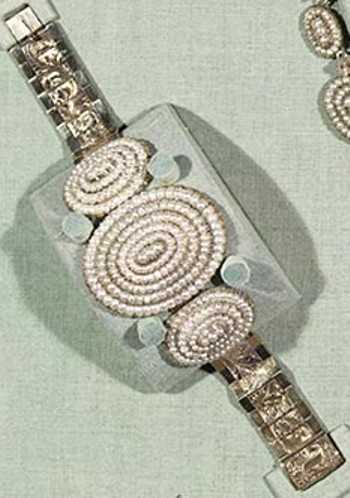 One of the seed pearl bracelets