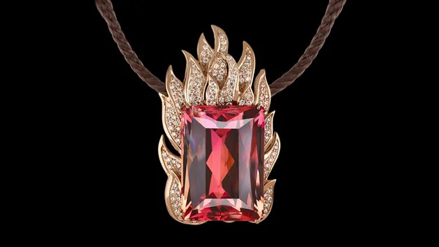 THE 97.45-CARAT BLAZE IMPERIAL TOPAZ IS IN THE COLLECTION OF THE FIELD MUSEUM OF NATURAL HISTORY. - (PHOTO: "GEMS AND GEMSTONES: TIMELESS NATURAL BEAUTY OF THE MINERAL WORLD" BY GRANDE &amp; AUGUSTYN, U OF CHICAGO PRESS.)