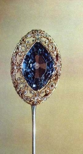  Russian stickpin with a 7.50 carat blue diamond rumored to have been cut from the same blue diamond as the Hope Diamond. 