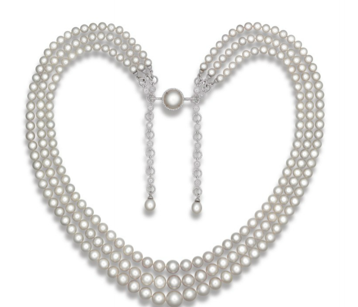  An exceptional natural pearl and diamond necklace, by Paspaley.&nbsp;The three-strand necklace composed of two hundred thirty-seven natural pearls gathered by a button-shaped natural pearl surrounded by circular-cut diamonds. 