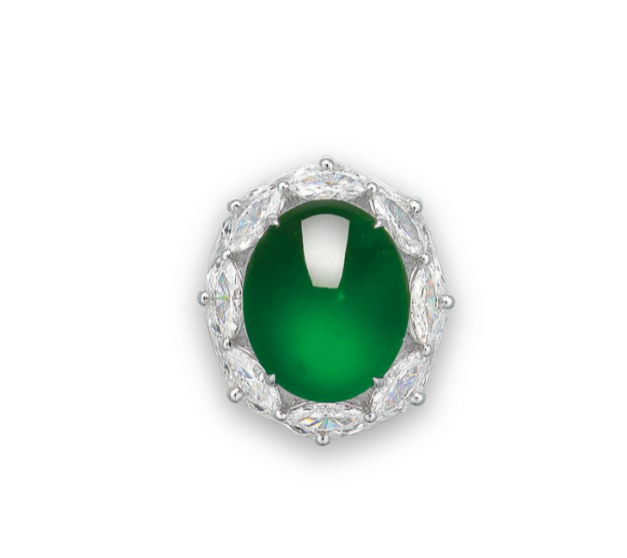  A natural jadeite and diamond ring.&nbsp; A natural oval jadeite cabochon, within a marquise-cut diamond two-tiered surround, to the circular-cut diamond three quarter-hoop, mounted in gold 